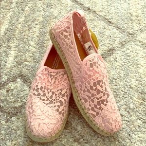 Woman’s pink toms
